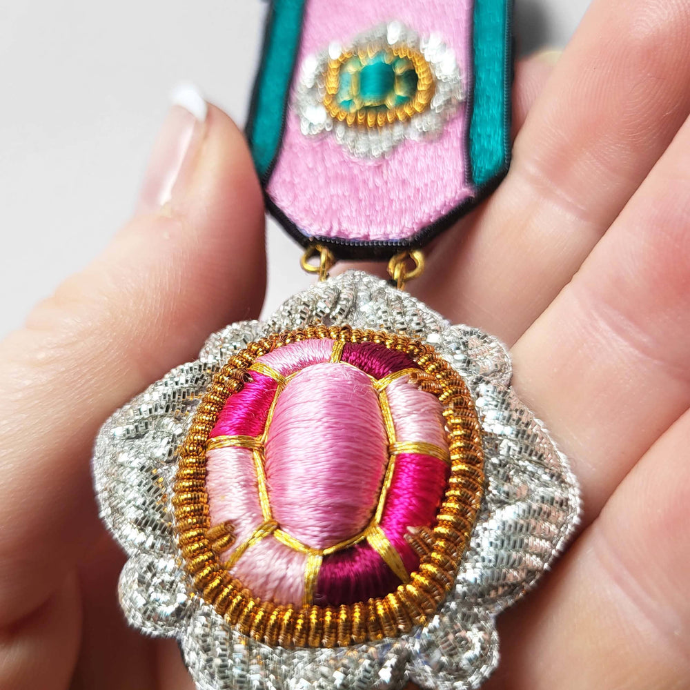 Youkounkoun emerald & ruby medal - Miss Parfaite 